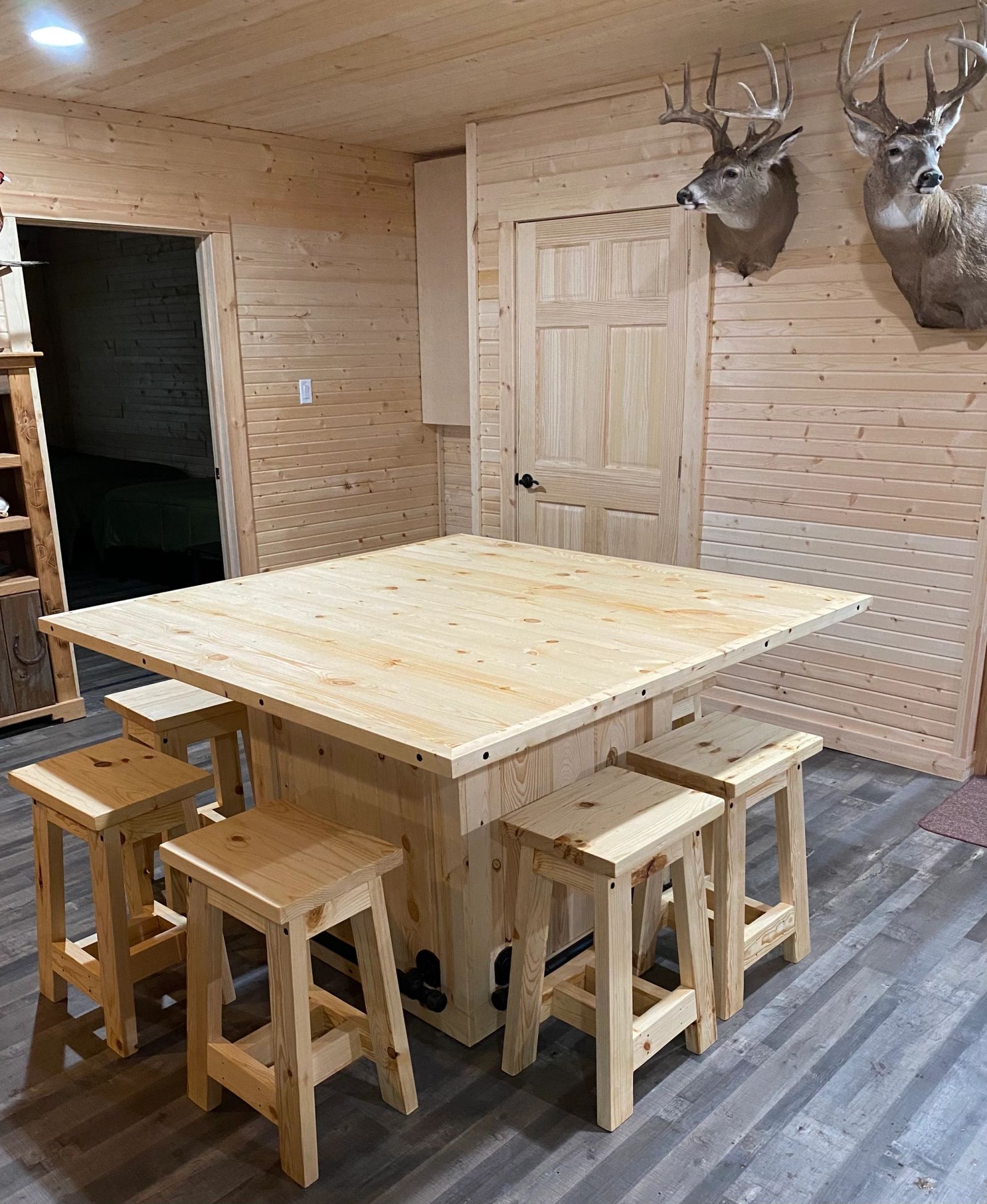 Guest cabin dining table and stools at the South Dakota hunting lodge