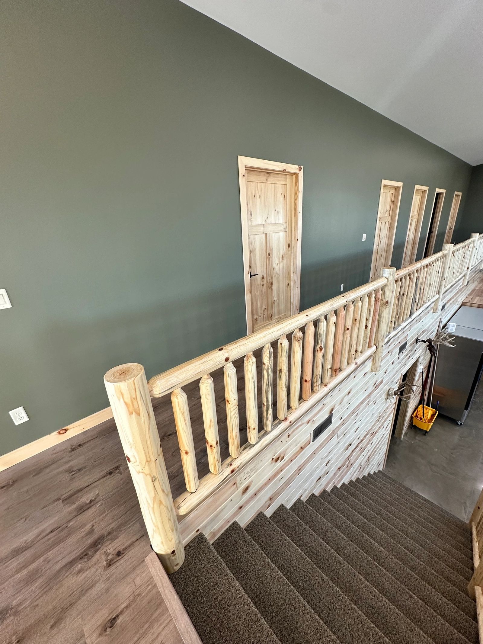 Staircase to the sleeping loft inside the South Dakota hunting lodge