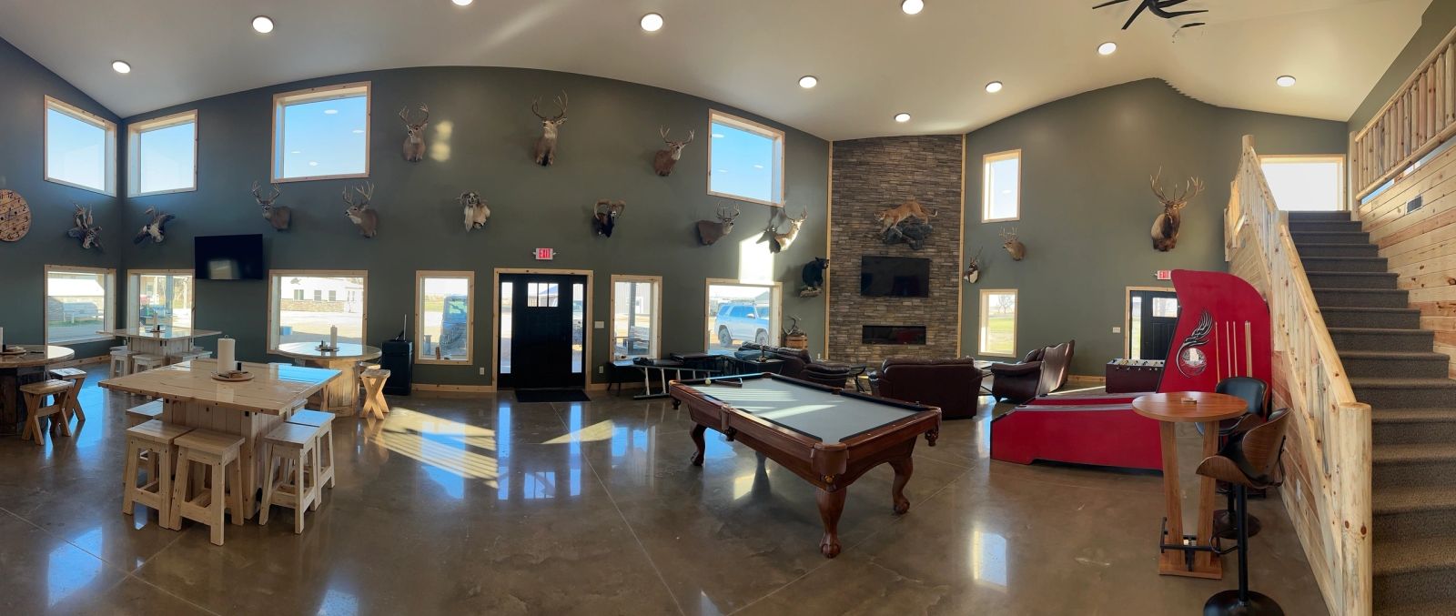 Great room with pool table inside the South Dakota pheasant hunting lodge